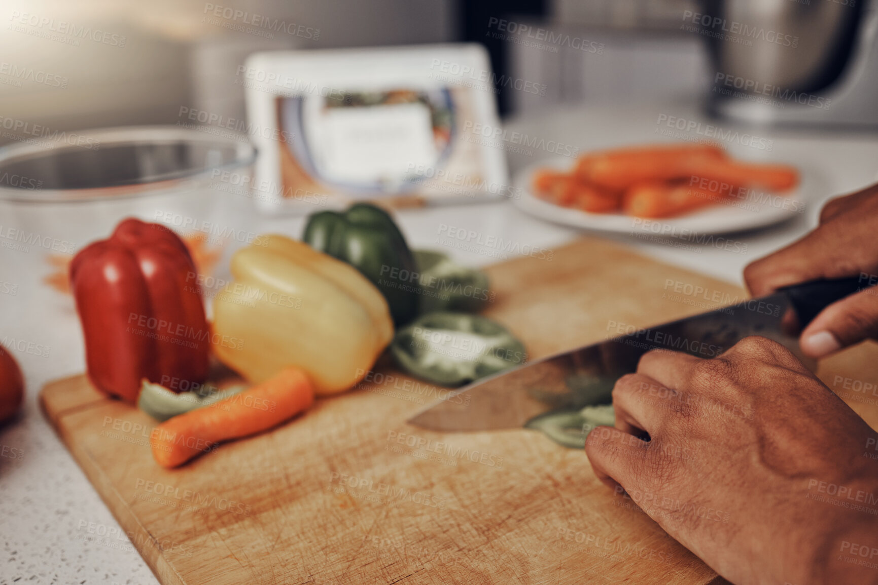 Buy stock photo Kitchen, cutting board and vegetables being cut for cooking a healthy, organic and delicious meal. Food, nutrition and chef chop or preparing fresh produce peppers for a diet dinner, lunch or supper.