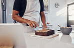 Decoration, baking and man with a cake in the kitchen for birthday food, dessert and pudding. Cooking, preparation and baker learning to decorate a sweet treat for a celebration on a table in a house