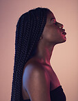 Peace, calm and black woman with braids in a studio with a makeup, cosmetic and face routine. Sensual, cosmetics and African female model with a relaxing positive mindset isolated by pink background.