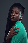 Black woman, fashion and makeup in studio for beauty, wellness or cosmetics for skincare glow by background. African gen z model, cosmetic or edgy hipster clothes for pride, satisfaction or self love