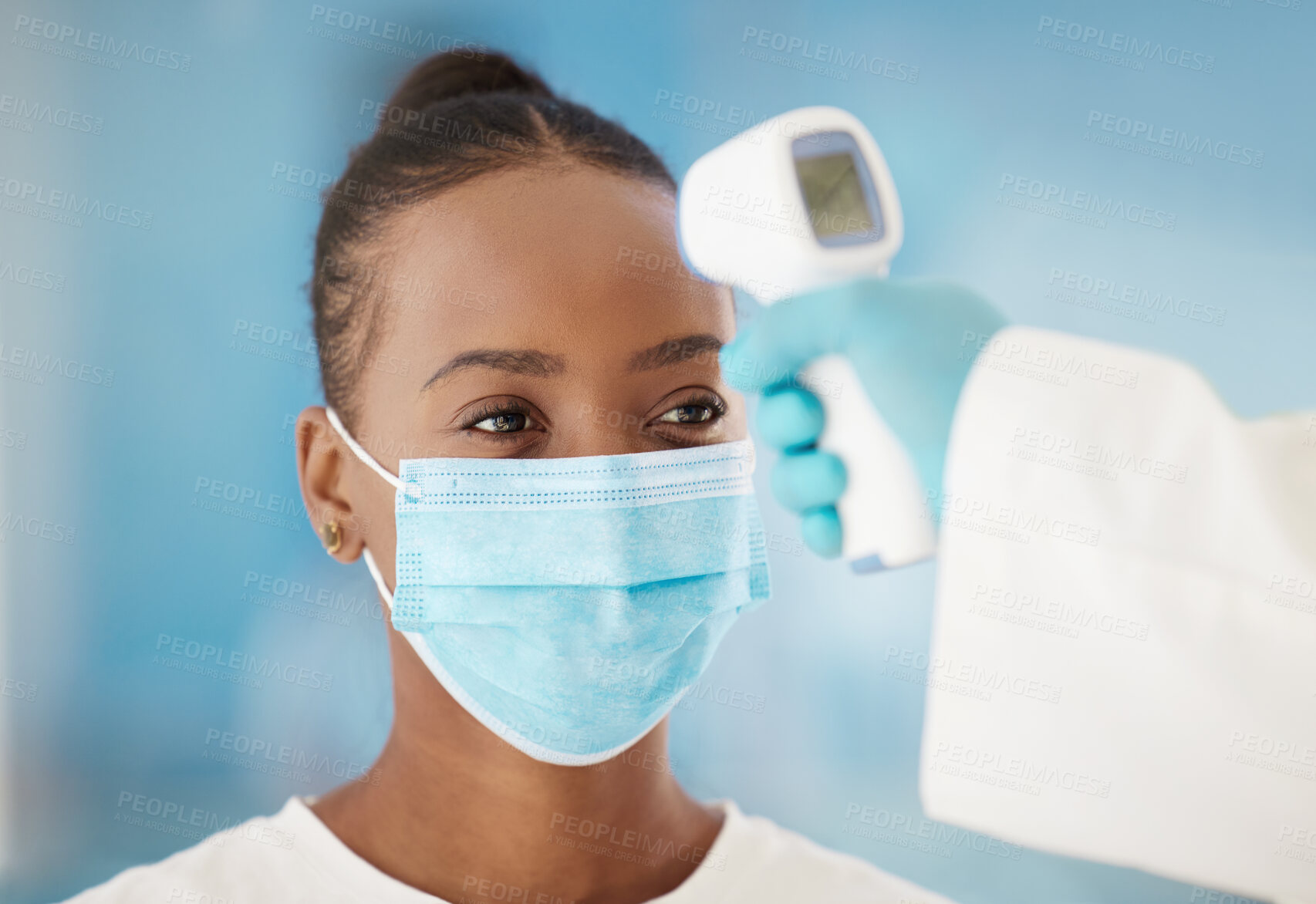 Buy stock photo Temperature, healthcare and black woman with covid test for medical safety, consultation and health. Thermometer, sick and African girl with a face mask for a virus and hand of a doctor to check