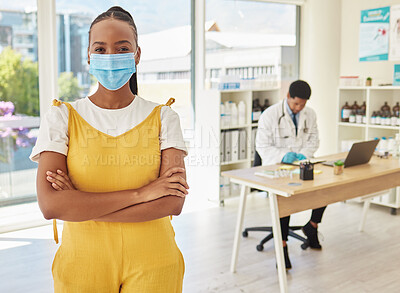 Buy stock photo Portrait, covid and healthcare with a black woman patient in a hospital standing arms crossed for her vaccination. Vaccine, mask and medical with a female in a clinic for heakth, cure or treatment
