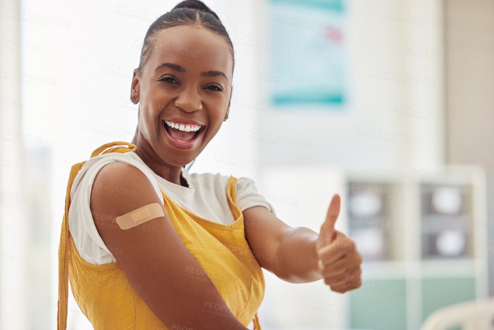 Buy stock photo Vaccine bandage, covid 19 and woman portrait with thumbs up emoji gesture for healthcare, medicine and immunity. Virus, safety first aid or African hospital patient with medical vaccination injection