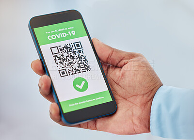 Buy stock photo Covid, vaccination and mobile certificate for travel, trip or medical certification on a phone. Technology, healthcare and closeup of hand with app for coronavirus with barcode for immunity vaccine.