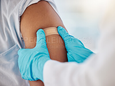 Buy stock photo Covid, vaccine and plaster on the arm of a black man patient in a hospital for an injection or healthcare. Doctor, medical and insurance with a male in a clinc for her corona virus vaccination