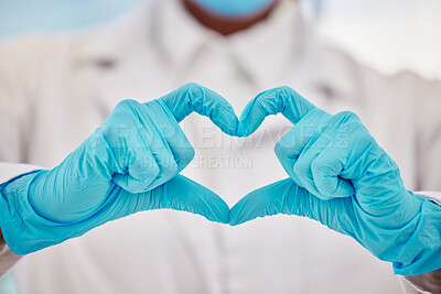 Buy stock photo Healthcare, heart or hands and a doctor in a hospital with gloves making a gesture or hand sign for health. Medical, insurance and love with a medicine professional gesturing an emoji, symbol or icon