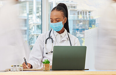 Buy stock photo Covid 19, laptop and doctor with notebook writing summary of corona virus research, medicine report or healthcare information. Fast busy hospital, medical study or clinic nurse or black woman working