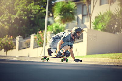 Skateboard, street and mock up with a sports man skating or training outdoor while moving at speed for action. Fitness, exercise and road with a male skater or athlete outside to practice his balance