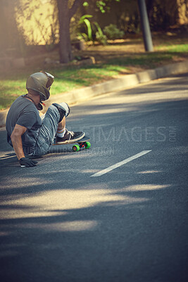 Skateboard, street and mockup with a sports man skating or training outdoor while moving at speed for action. Fitness, exercise and road with a male skater or athlete outside to practice his balance