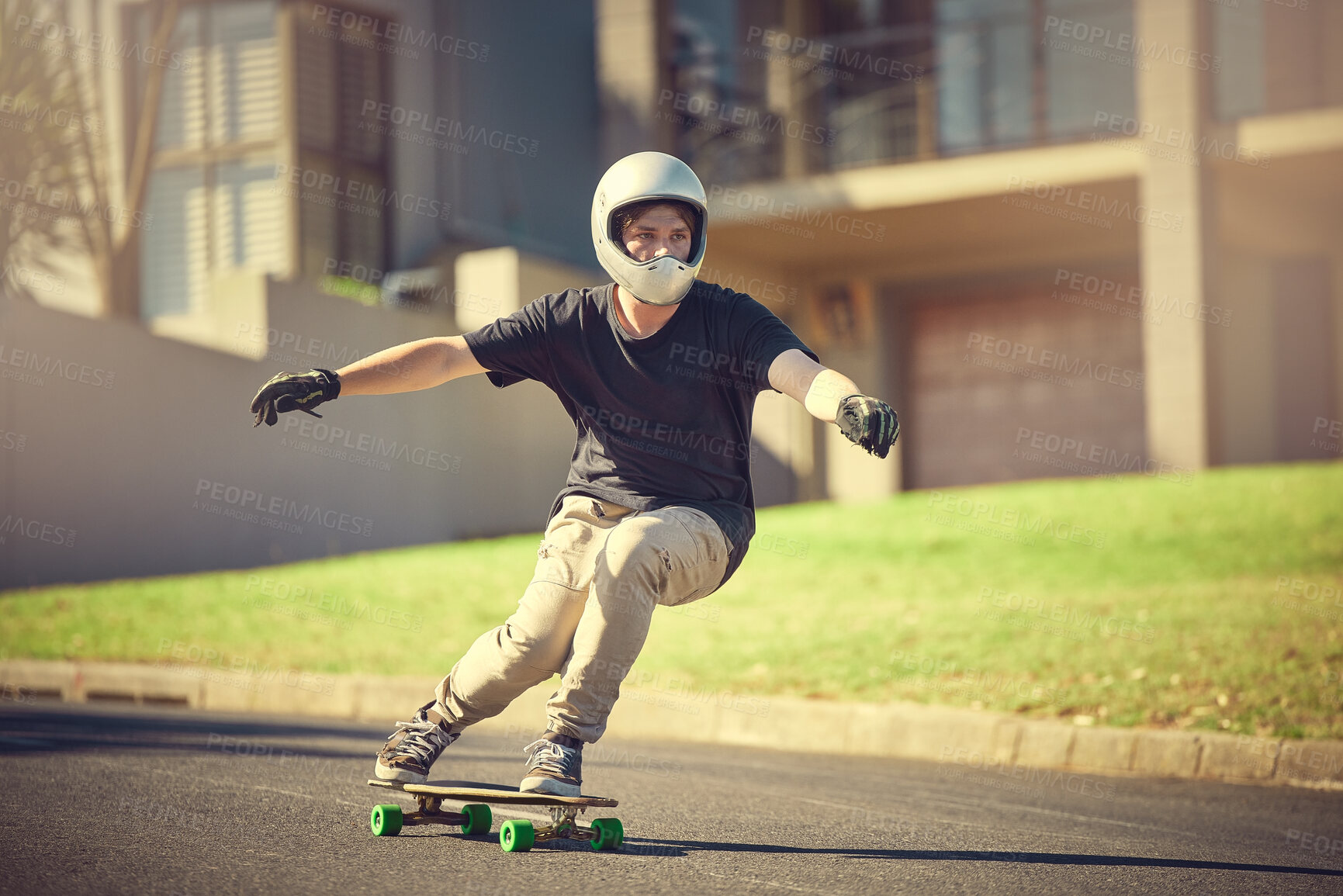 Buy stock photo Skateboard, training or mockup with a sports man skating on a street outdoor while moving at speed for action. Fitness, exercise and road with a male skater or athlete outside to practice his balance