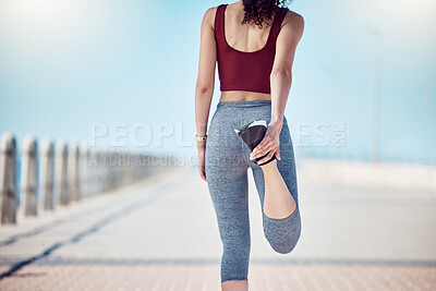 Buy stock photo Fitness, woman and stretching legs at beach promenade for exercise, wellness and training. Back of athlete, runner and person warm up body at seaside for summer workout, sports and marathon running 