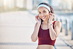 Fitness, portrait and woman with music at promenade, marathon training and wellness in Miami. Sports, happy athlete and outdoor runner with earphones for running exercise, cardio workout and sunshine