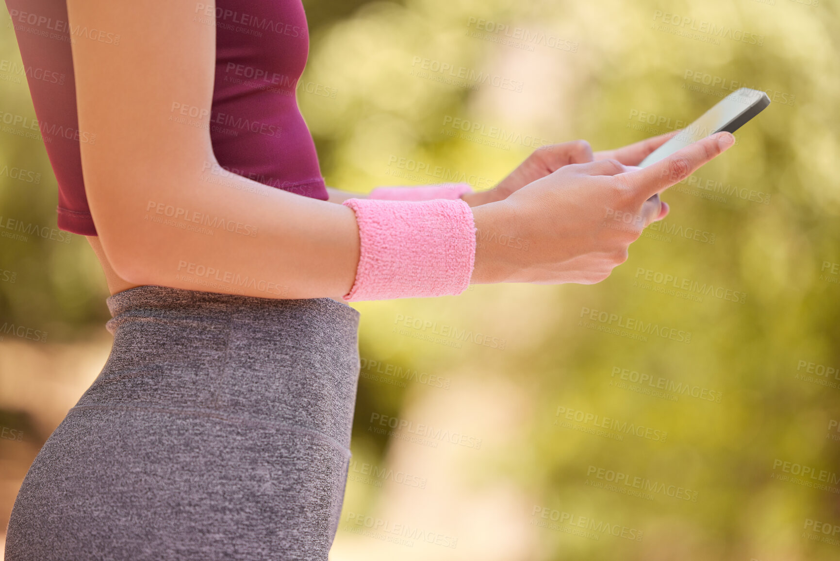 Buy stock photo Phone, fitness and woman hands in park to search digital workout online, reading notification or social media. Closeup sports person, cellphone and connection of training, health data and running app