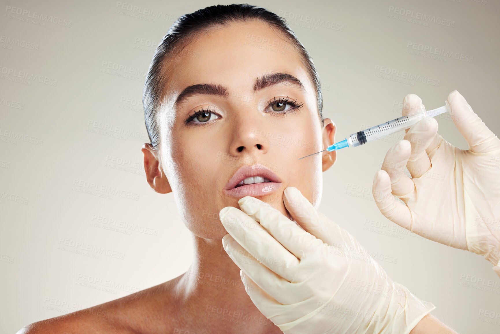 Buy stock photo Skincare, collagen and portrait of woman with injection in lips from healthcare professional, anti aging treatment in studio. Beauty, model and aesthetic facial lip filler syringe on background