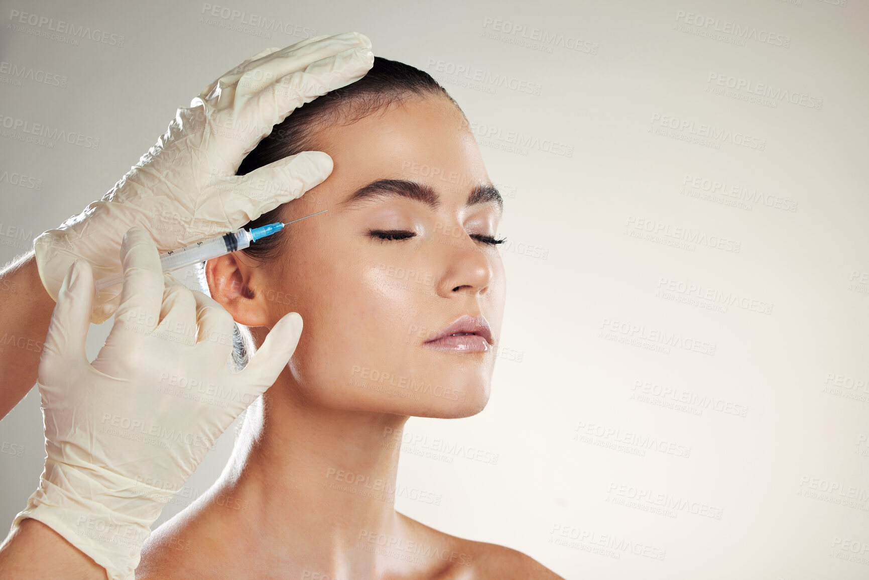 Buy stock photo Dermatology, woman or injection for plastic surgery, beauty or filler with gloves on studio background. Lady, female or collagen for skincare, needle for procedure or cosmetics for healthy skin