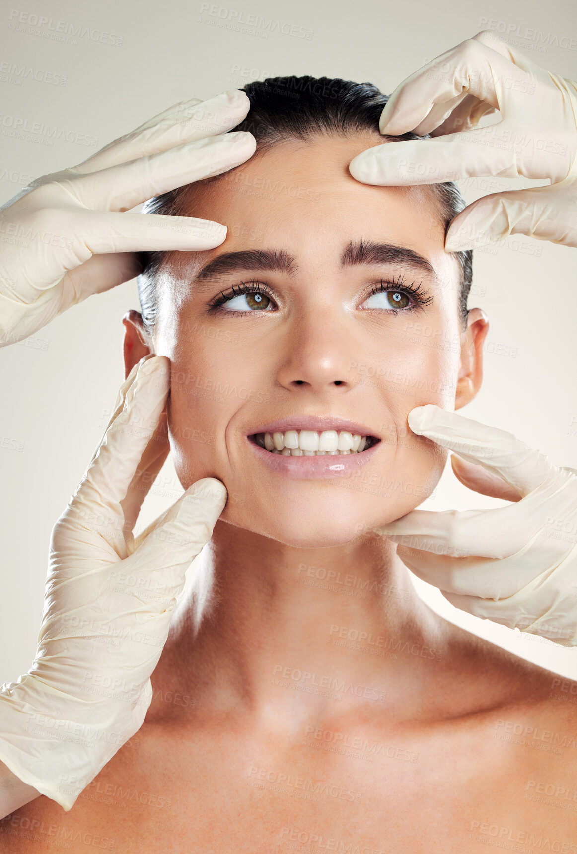 Buy stock photo Beauty, plastic surgery and filler on face of woman with collagen dermatology cosmetics. Headshot of a skincare model with professional hands for medical procedure on facial skin and grey background