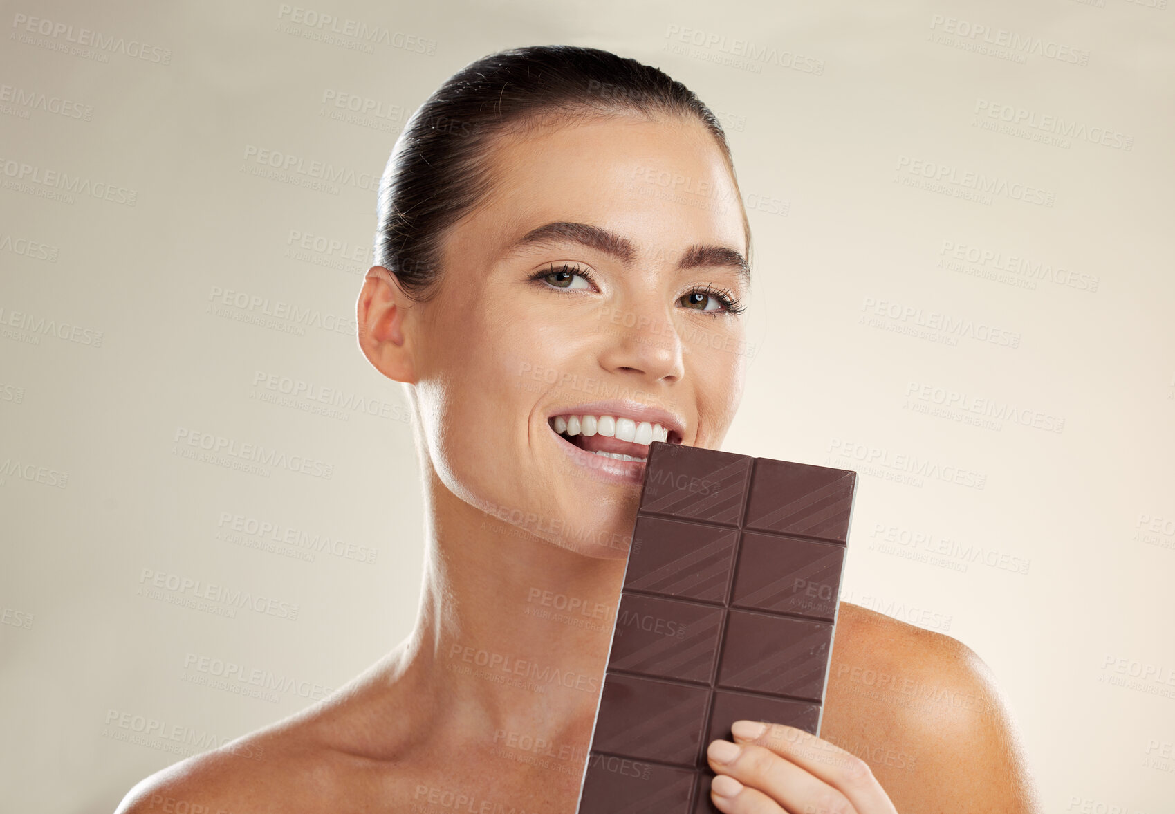 Buy stock photo Beauty portrait, eating and woman with chocolate bar, junk food or dessert for sugar sweets, candy snack or cheat meal. Cosmetics makeup, skincare and hungry model with cacao product for antioxidants