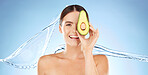 Skincare, beauty and woman portrait with avocado for natural skin dermatology cosmetic product. Water splash and face of aesthetic model in studio for sustainable slef care for health and wellness
