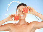 Beauty, water and portrait of happy woman with grapefruit for fruit detox, health wellness or natural facial skincare. Spa salon, cleaning and nutritionist model with food product for vitamin c glow