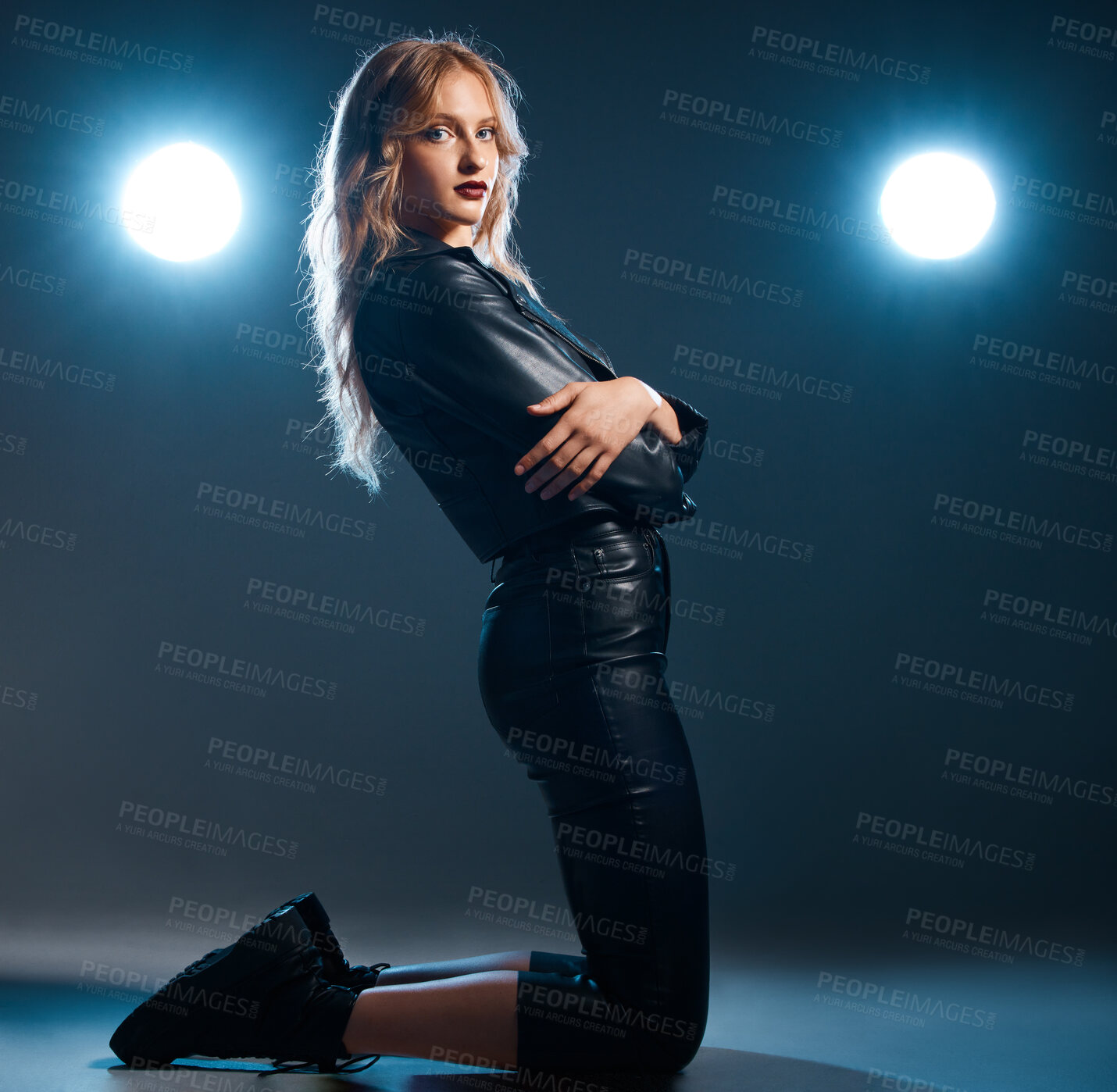 Buy stock photo Show, performance and woman portrait of an isolated model or singer with stage lights. Dark background, studio and theatre presentation of a young female dancer ready for creative dance with light