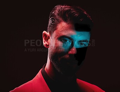 Buy stock photo Art, neon and creative portrait of man with light reflection in eyes on serious face with self expression. Futuristic fashion, male model and beauty with red and blue studio lights on dark background