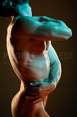 Buy stock photo Muscle, strong and body of a nude man with erotic creativity isolated on black background in studio. Creative, flexing and sexy naked model in fluorescent lighting for sensuality on a backdrop