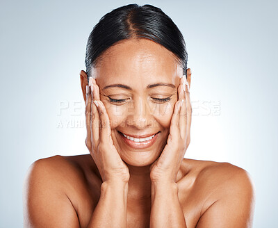 Buy stock photo Beauty, face and skincare of woman with eyes closed in studio isolated on a gray background. Makeup, cosmetics and happy senior female model touching skin after spa facial treatment for wellness.