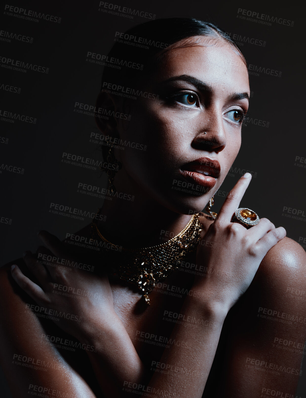 Buy stock photo Skincare, dark and woman with jewelry, cosmetics and treatment with girl on studio background. Makeup, girl and female with necklace, ring or grooming routine for natural beauty, wellness or backdrop