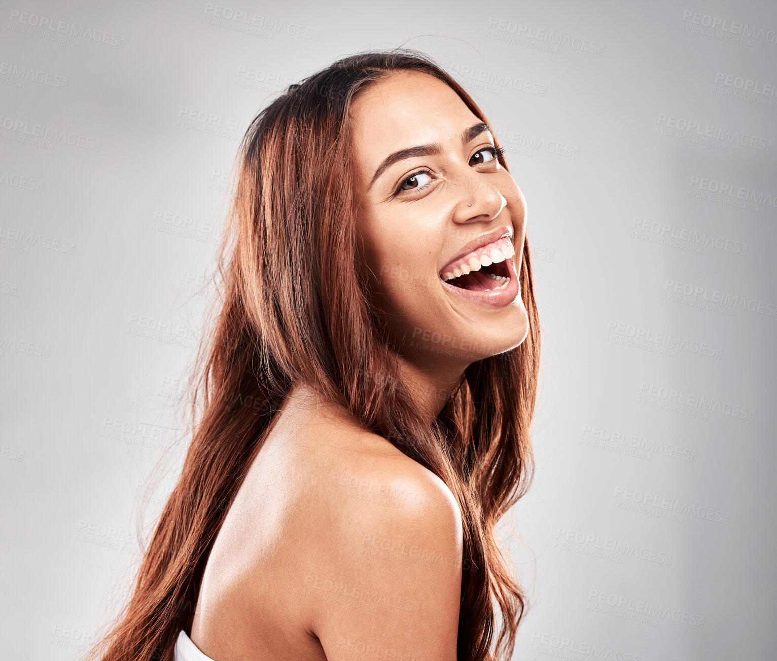 Buy stock photo Happy, portrait and woman in studio for hair, beauty and  salon treatment on grey background. Face, haircare and model laughing for luxury, care and shine, keratin and smooth results isolated