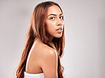 Face, mockup and woman with hair in portrait, beauty and skin with glow and shine isolated on studio background. Hairstyle, cosmetic skincare and wellness with keratin treatment and styling