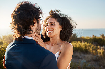 Buy stock photo Marriage, wedding and bride with groom on by ocean for ceremony, commitment and celebration of love. Romance, happiness and interracial couple bonding, hug and smile on mountain, nature and outdoors