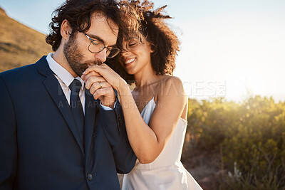 Buy stock photo Love, happy and wedding with couple in nature for celebration, happiness and romance. Sunset, hug and affectionate with husband and wife in embrace at countryside for kiss, marriage or smile together