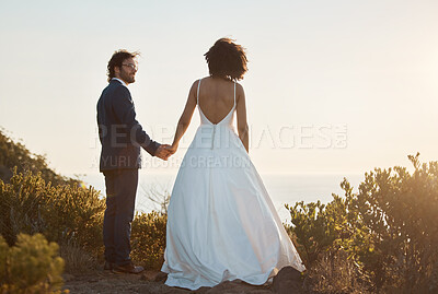 Buy stock photo Love, wedding and holding hands with couple in nature park for celebration, romance and happiness. Sunset, support and summer with bride and groom in countryside for marriage, ceremony and bonding