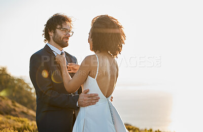 Buy stock photo Wedding, couple and bride with groom by ocean for marriage ceremony, commitment and celebration. Romance, love and interracial man and woman bonding, happy and smile on mountain, nature and outdoors
