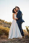 Wedding bride and groom portrait at sunset with embrace together for love, care and connection in nature. Partner, soulmate and bond of interracial people at outdoor marriage celebration on hill.