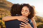 Hug, trust and couple at sunset wedding with embrace together for care, love and support in married life. Marriage, black woman and man at romantic marriage event in Cape Town, South Africa nature.