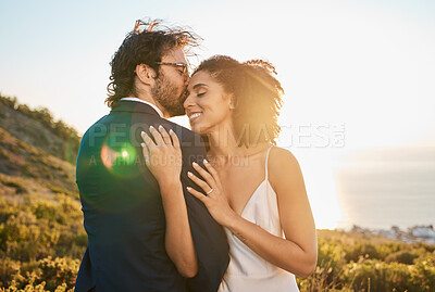 Buy stock photo Love, kiss and wedding with couple in nature for celebration, happiness and romance. Sunset, hug and affectionate with man and woman in embrace at countryside for happy, marriage and smile together