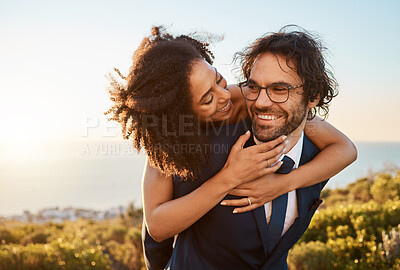 Buy stock photo Bride, groom and piggyback hug at wedding in nature, happy and smile while celebrating love, beginning and relationship. Marriage, interracial couple and black woman and man embrace outdoor with fun
