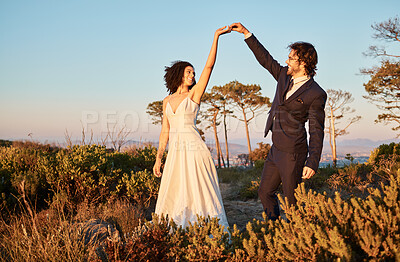 Buy stock photo Love, wedding and holding hands for dance with couple in nature park for celebration, romance and happiness. Sunset, support and summer with bride and groom for marriage, ceremony and bonding