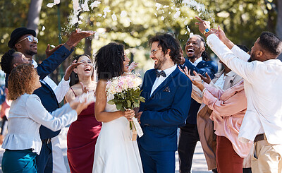 Buy stock photo Confetti, wedding couple and marriage celebration of crowd throwing flower petals outdoor. Happiness, excited and social event with bride and man laughing from love and congratulations applause 
