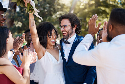Buy stock photo Happy bride and groom celebrate wedding with excited and cheerful applause in crowd of guests. Interracial love and happiness of couple at marriage event together with clapping and smile.