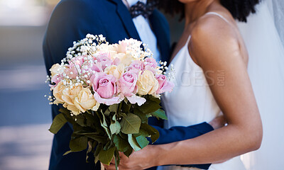 Buy stock photo Flowers, wedding or marriage with a bride and groom outdoor together after a ceremony of tradition or celebration. Bouquet, reception or commitment with a married couple outside as husband and wife