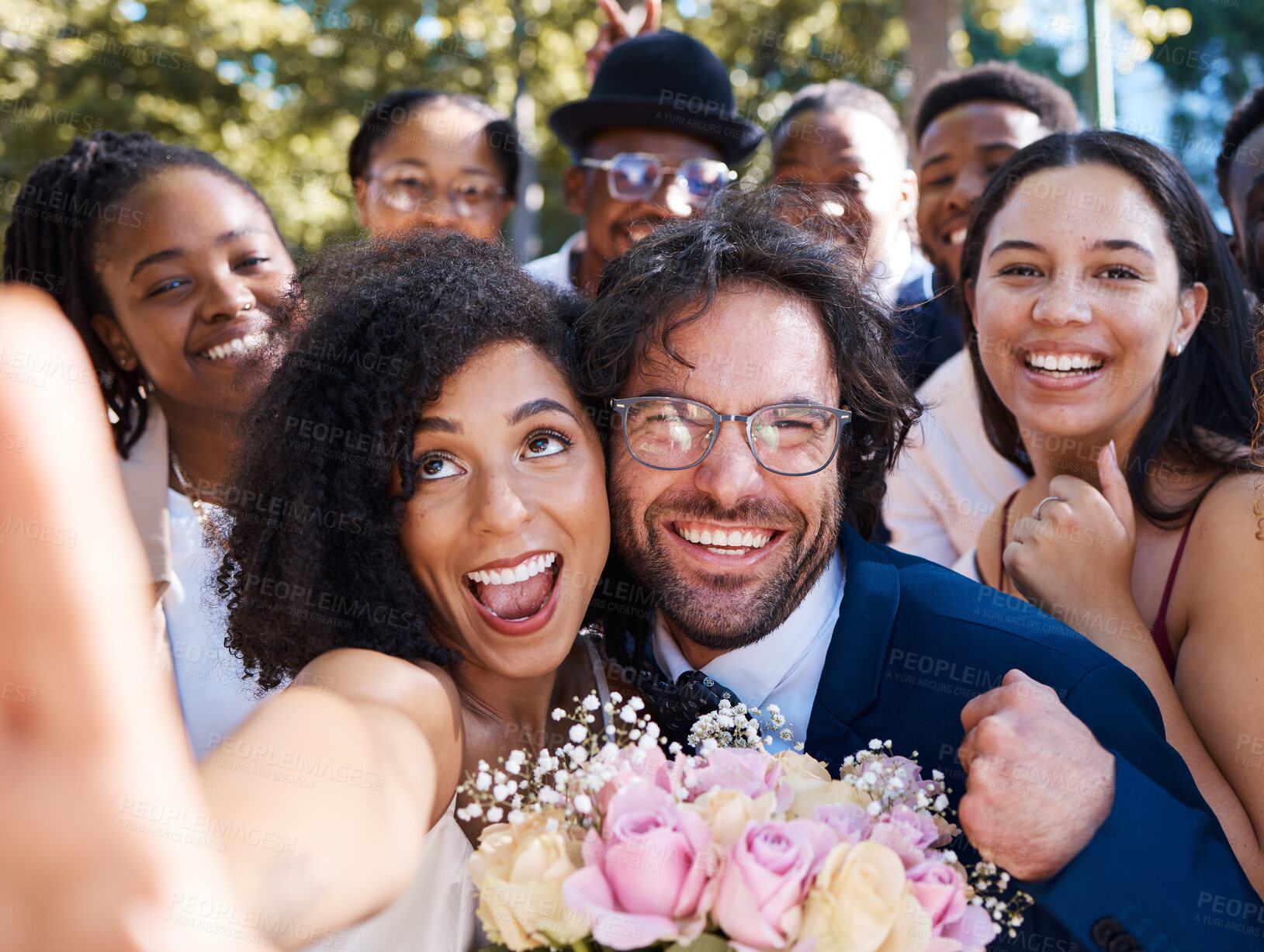 Buy stock photo Friends, bride and groom with wedding selfie for outdoor ceremony celebration of happiness, love and joy. Marriage, happy and interracial relationship photograph of togetherness with excited guests

