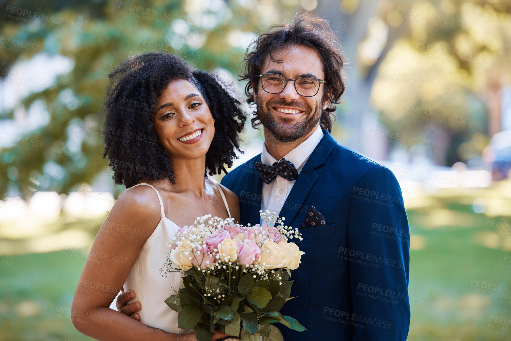 Buy stock photo Couple portrait, wedding and nature park marriage celebration event for bride and groom together. Married interracial man and woman outdoor with trust, partnership and a hug with flower bouquet