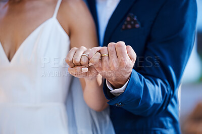 Buy stock photo Hands, pinky promise and wedding ring of couple outdoor celebration of trust, partnership and love. Marriage commitment or loyalty of interracial bride and groom at ceremony to celebrate togetherness
