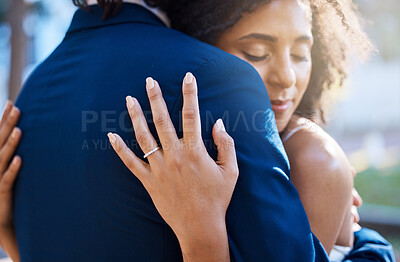 Buy stock photo Love romance, wedding ring and couple hug outdoors, bonding or caring. Marriage band, commitment hand and diversity, affection and care of woman and man or bride and groom hugging, embrace and cuddle