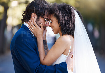Buy stock photo Love, happy couple and wedding hug outdoor at marriage celebration event with commitment. Interracial man and woman together at park with trust, partnership and gratitude with a touch on the face