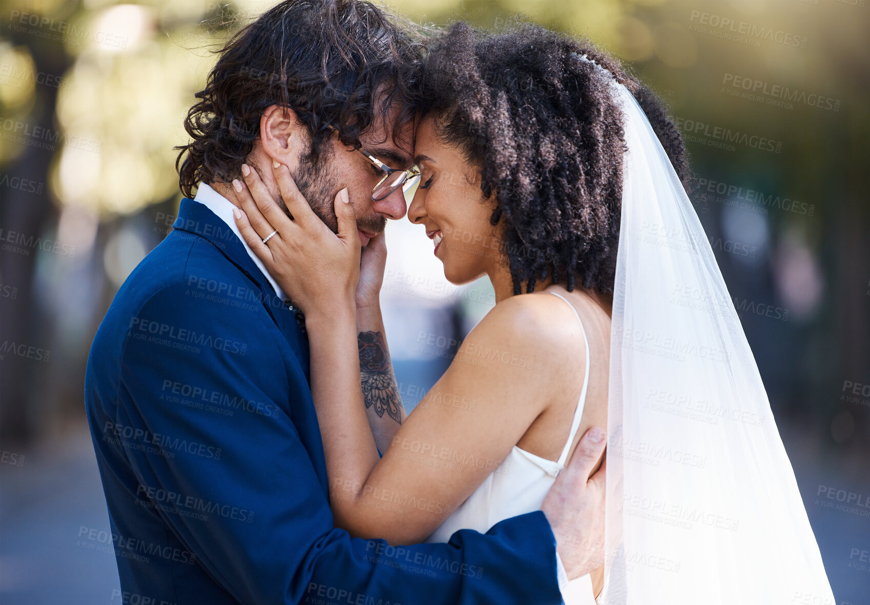 Buy stock photo Love, happy couple and wedding hug outdoor at marriage celebration event with commitment. Interracial man and woman together at park with trust, partnership and gratitude with a touch on the face