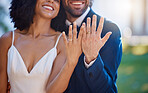 Married couple, hands and wedding rings with smile for marriage, commitment or honeymoon in the outdoors. Hand of happy groom and bride smiling and showing ring in symbol for wife and husband