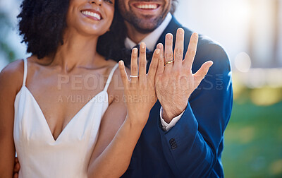 Buy stock photo Married couple, hands and wedding rings with smile for marriage, commitment or honeymoon in the outdoors. Hand of happy groom and bride smiling and showing ring in symbol for wife and husband